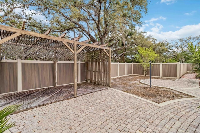 view of patio / terrace featuring a fenced backyard and a pergola