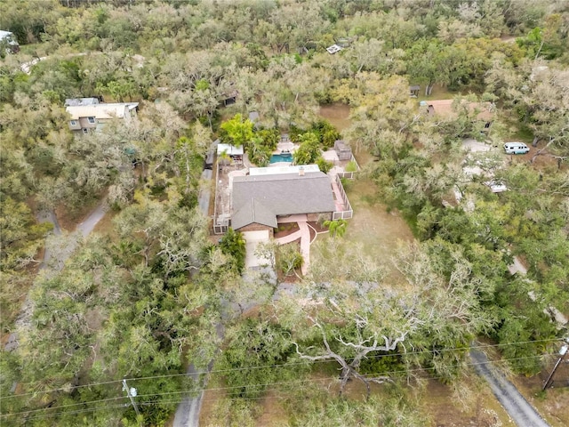 aerial view featuring a view of trees