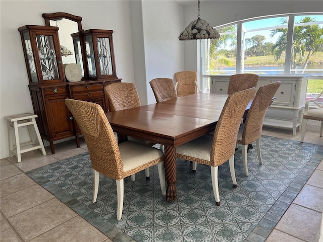 dining area with light tile patterned flooring