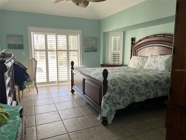 108 Fairway Rd, Rotonda West, FL 33947 - bedroom featuring tile patterned floors, lofted ceiling, and a ceiling fan