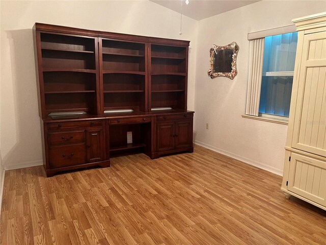 108 Fairway Rd, Rotonda West, FL 33947 - unfurnished office with light wood-style flooring and baseboards