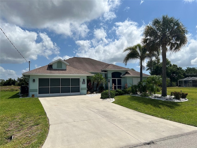 108 Fairway Rd, Rotonda West, FL 33947 - ranch-style home with concrete driveway, a front lawn, a garage, and stucco siding
