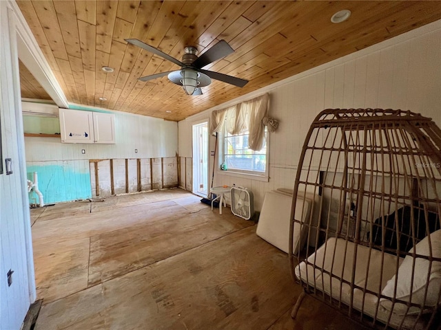 misc room featuring wooden ceiling and ceiling fan