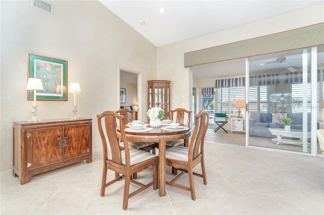 dining room with a ceiling fan, visible vents, and light tile patterned flooring