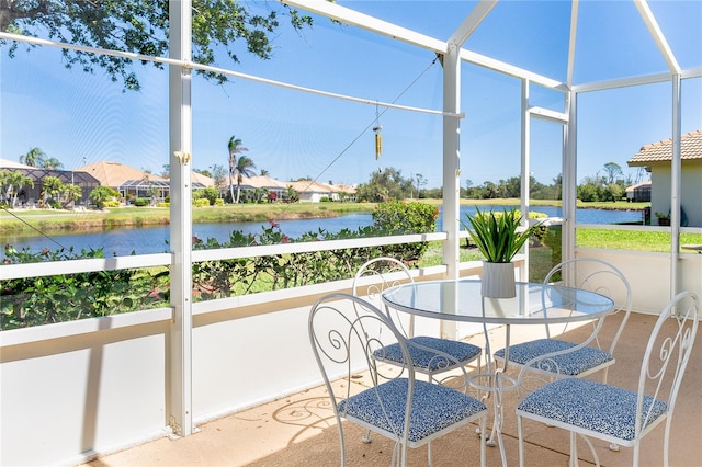 sunroom with a water view