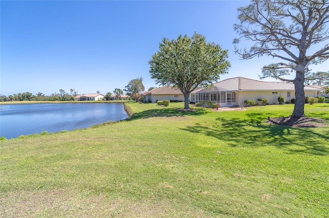 view of yard with a water view