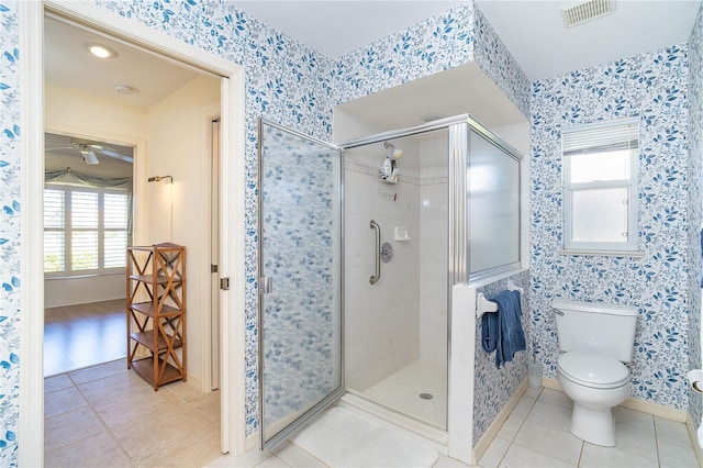 full bath featuring visible vents, toilet, a stall shower, tile patterned flooring, and wallpapered walls