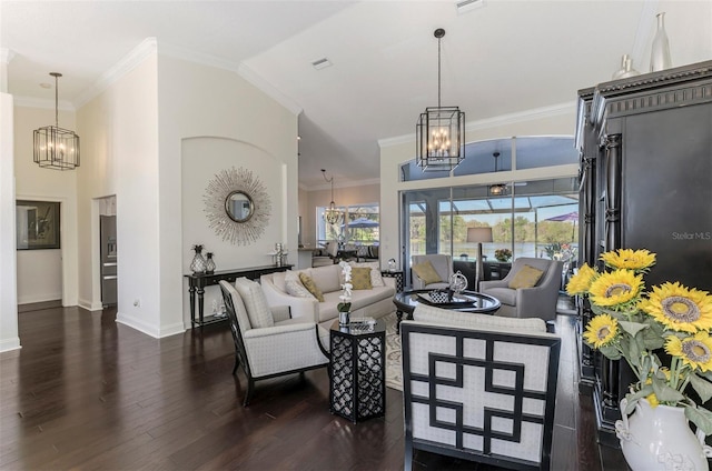 living room featuring high vaulted ceiling, a chandelier, wood finished floors, and ornamental molding