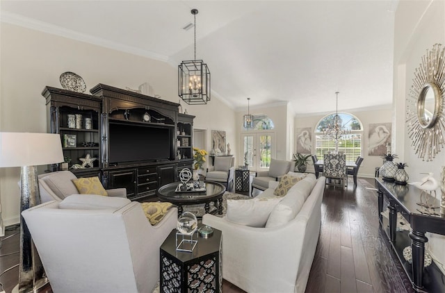 living area featuring baseboards, dark wood finished floors, an inviting chandelier, vaulted ceiling, and crown molding