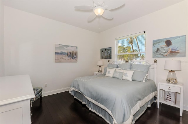 bedroom featuring dark wood-style flooring, ceiling fan, and baseboards