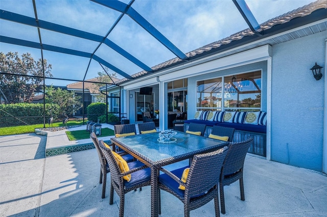 view of patio featuring a lanai and an outdoor living space