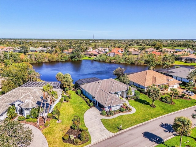 bird's eye view with a water view and a residential view