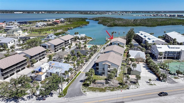 aerial view featuring a residential view and a water view