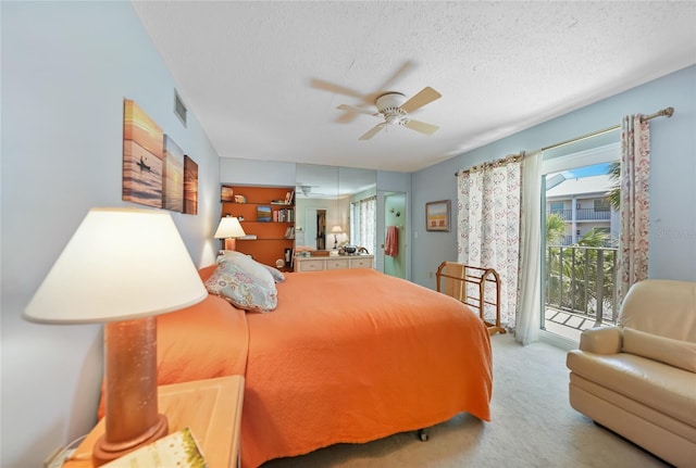 bedroom with visible vents, light carpet, ceiling fan, a textured ceiling, and access to outside