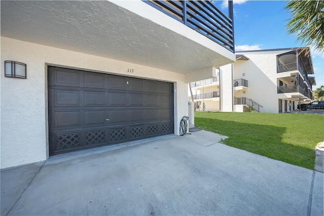 garage featuring driveway