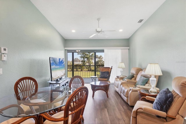 living room with visible vents, recessed lighting, ceiling fan, and wood finished floors