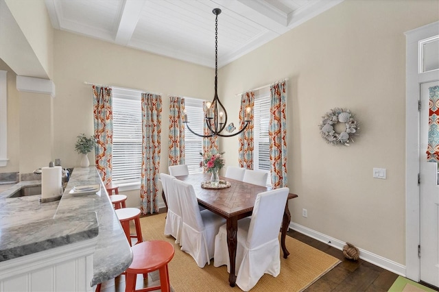 dining space with baseboards, light wood-style floors, beamed ceiling, and a notable chandelier