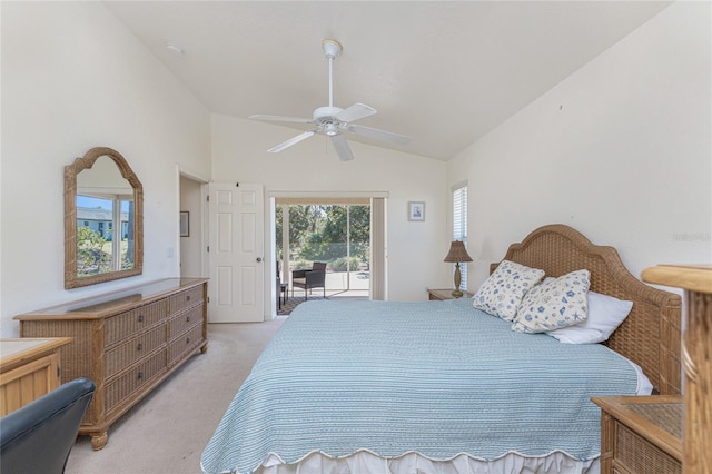 bedroom with a ceiling fan, access to exterior, vaulted ceiling, and light carpet