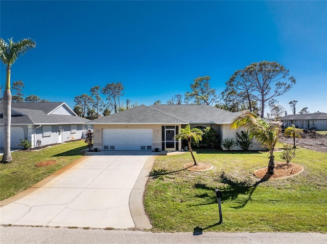 view of front of house with a front lawn, a garage, driveway, and stucco siding