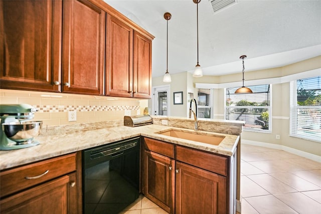 kitchen featuring visible vents, a peninsula, a sink, decorative backsplash, and black dishwasher