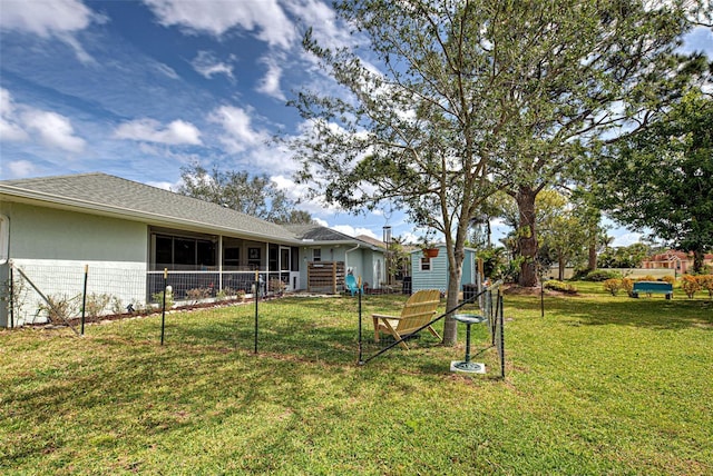 view of yard featuring fence