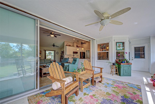 sunroom featuring lofted ceiling