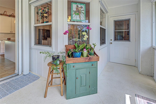 entrance to property with covered porch