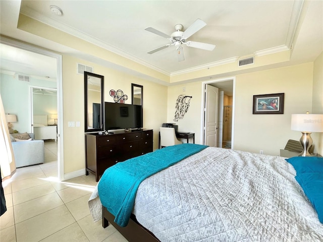 bedroom with light tile patterned flooring, visible vents, and crown molding