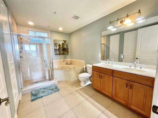 bathroom featuring a shower stall, visible vents, and a sink