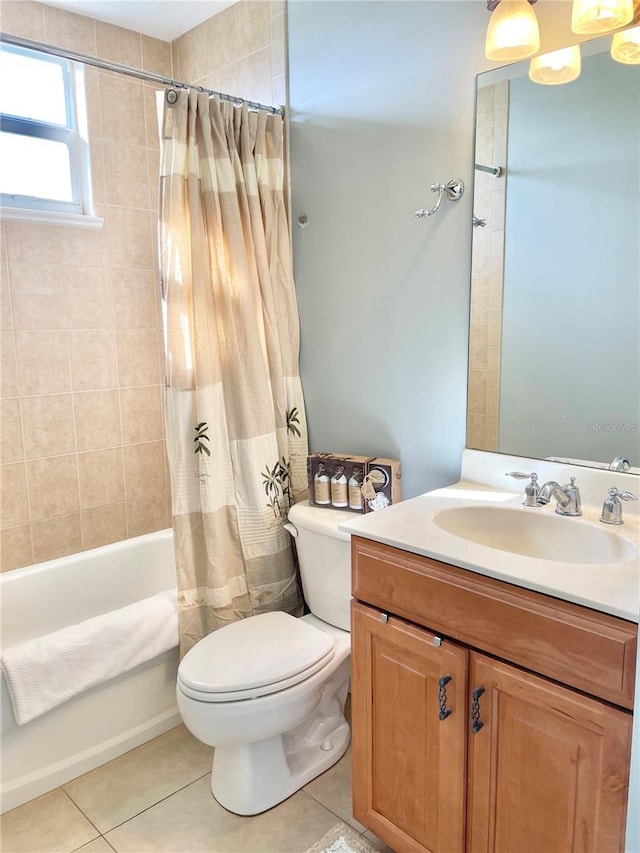 bathroom with tile patterned flooring, vanity, toilet, and shower / tub combo