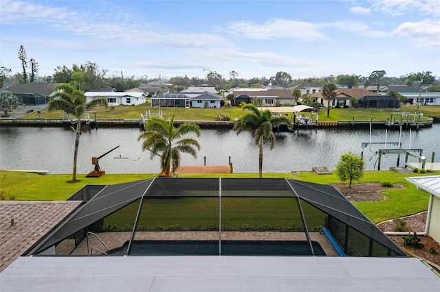 water view featuring a residential view, boat lift, and a boat dock