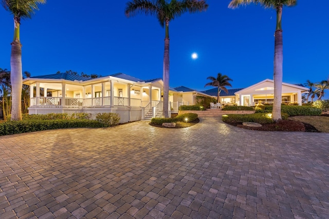 exterior space featuring curved driveway