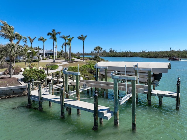 view of dock featuring a water view and boat lift