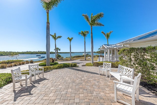 view of patio / terrace featuring a water view