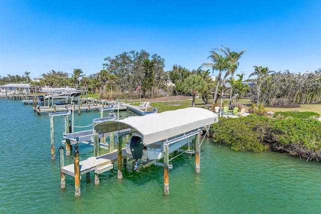 dock area with a water view and boat lift