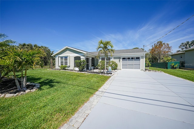 ranch-style house featuring stucco siding, a front lawn, fence, concrete driveway, and a garage