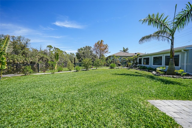 view of yard with fence