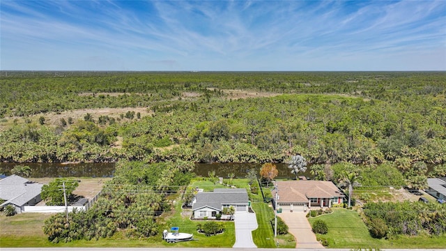 aerial view featuring a view of trees