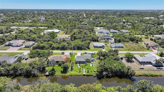 aerial view featuring a residential view and a water view