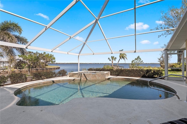 view of swimming pool featuring a lanai, a patio area, a water view, and a pool with connected hot tub