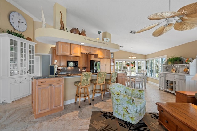 kitchen featuring visible vents, black appliances, ceiling fan with notable chandelier, glass insert cabinets, and vaulted ceiling