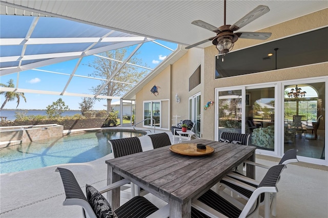 exterior space with a healthy amount of sunlight, lofted ceiling, and ceiling fan