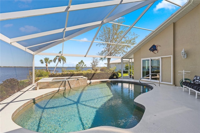 view of swimming pool with a patio area, glass enclosure, and a pool with connected hot tub