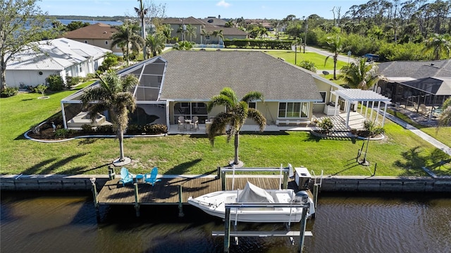 exterior space featuring a residential view and a water view