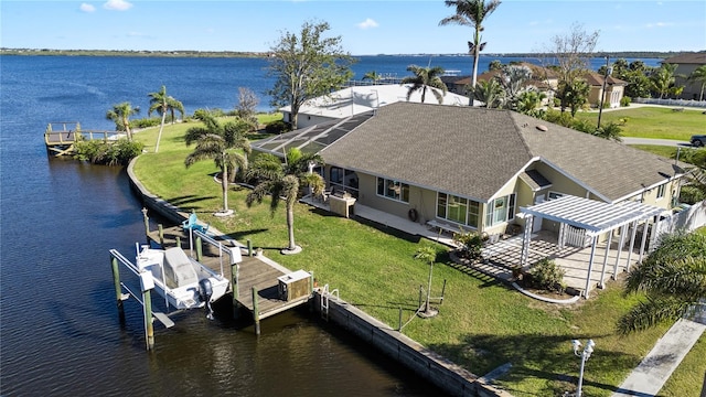 drone / aerial view featuring a water view