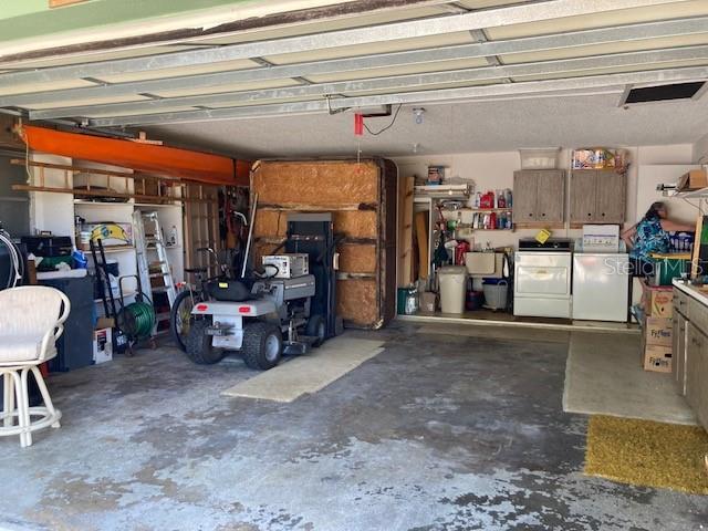 garage with separate washer and dryer