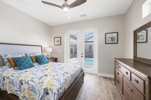 bedroom featuring baseboards, visible vents, access to exterior, french doors, and light wood-style floors