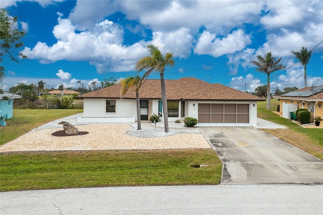 ranch-style home with a front yard, concrete driveway, a garage, and stucco siding