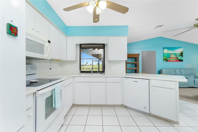 kitchen with visible vents, open floor plan, light countertops, white appliances, and a sink