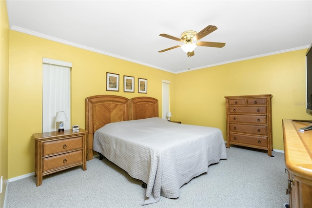 bedroom featuring a ceiling fan, light colored carpet, baseboards, and ornamental molding